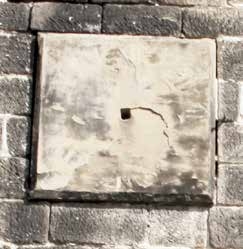 Blocked stone panel marking a former opening